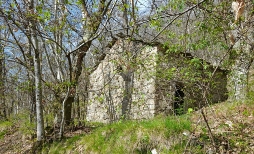 Rural building before Rossano Valley